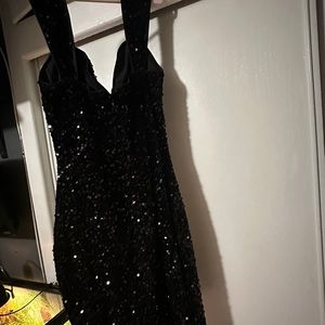 Shiny black mini dress